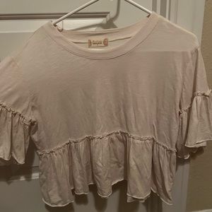 Cream top with ruffles